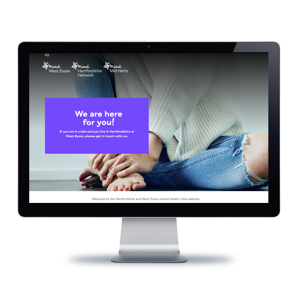 Image of Mental Health Crisis website displayed on a desktop monitor