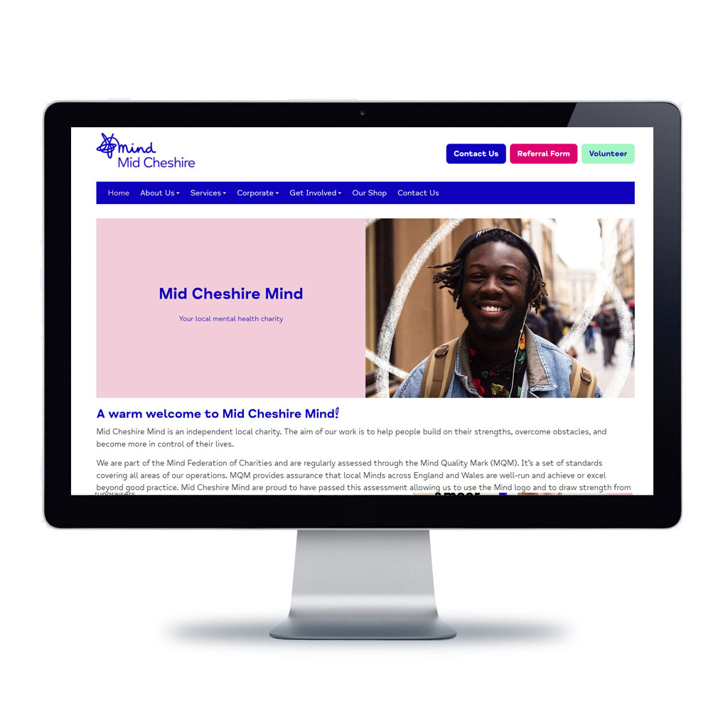 Image of Mid Cheshire Mind website resposively displayed on computer monitor