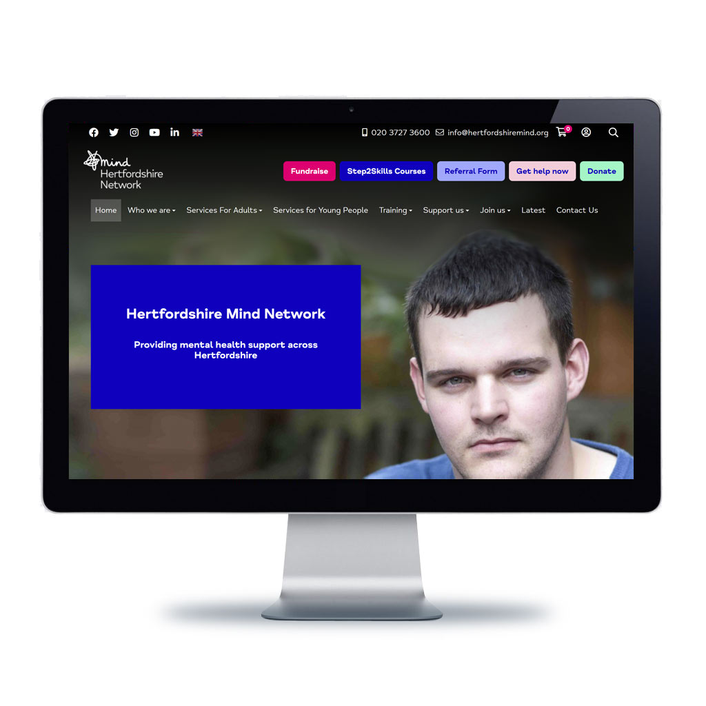 Image of Hertfordshire Mind Network home page displayed on computer monitor